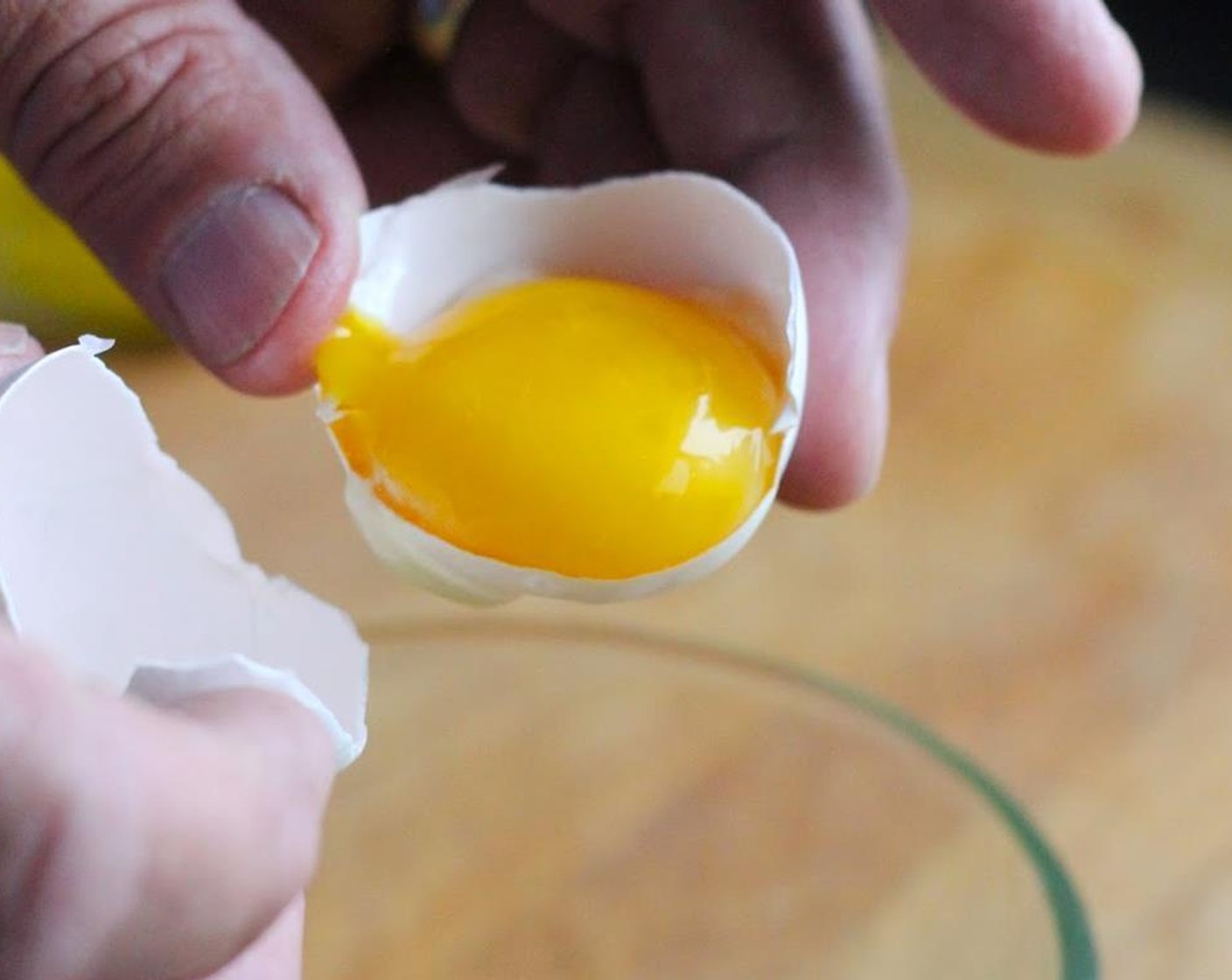 step 1 Separate 2 Eggland's Best Classic Eggs (2) placing egg yokes in a large measuring bowl.