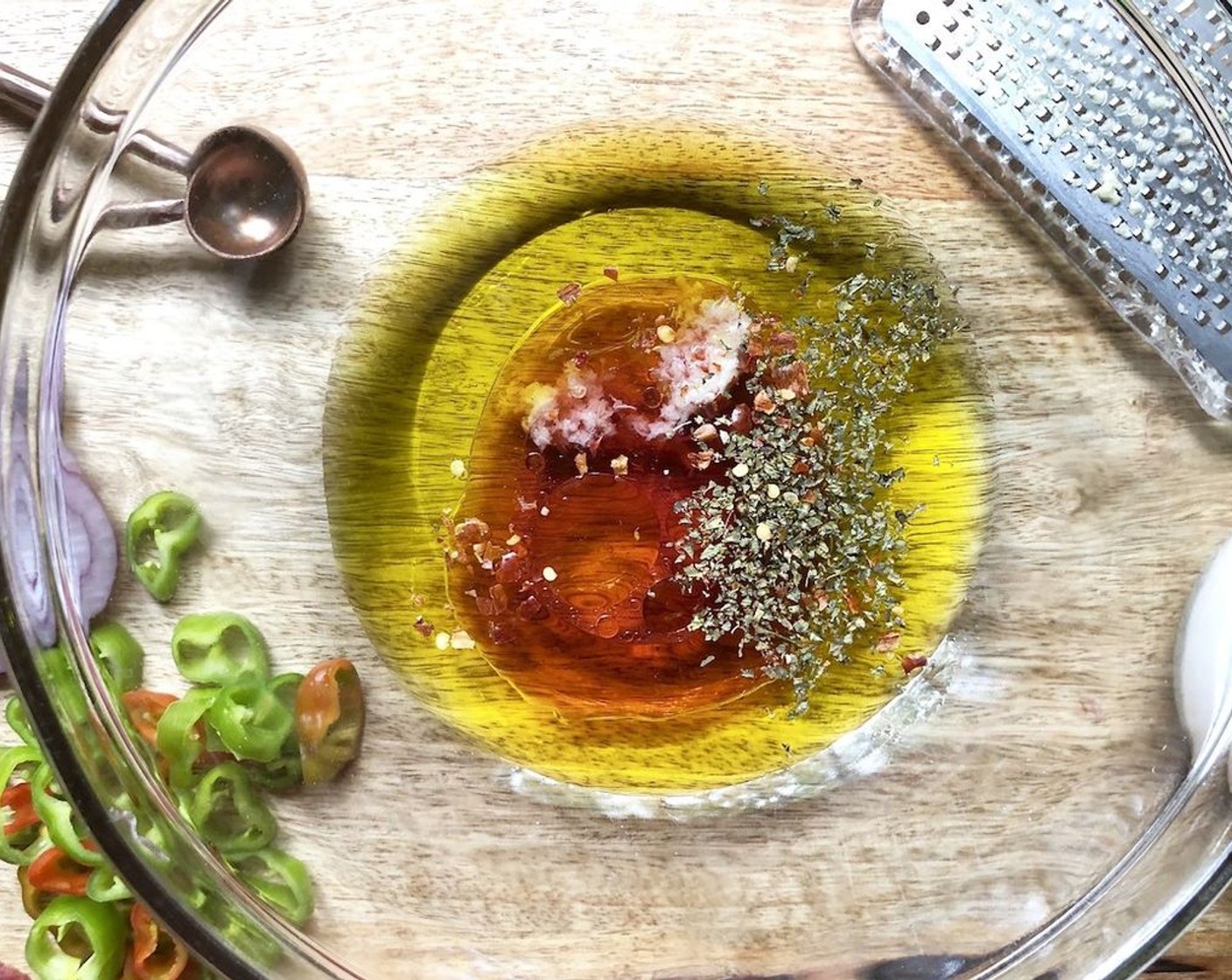 step 1 Mix Garlic (1 clove), Extra-Virgin Olive Oil (1/3 cup), Red Wine Vinegar (4 Tbsp), Dried Oregano (1/2 tsp), and Crushed Red Pepper Flakes (1 pinch) in a large bowl.
