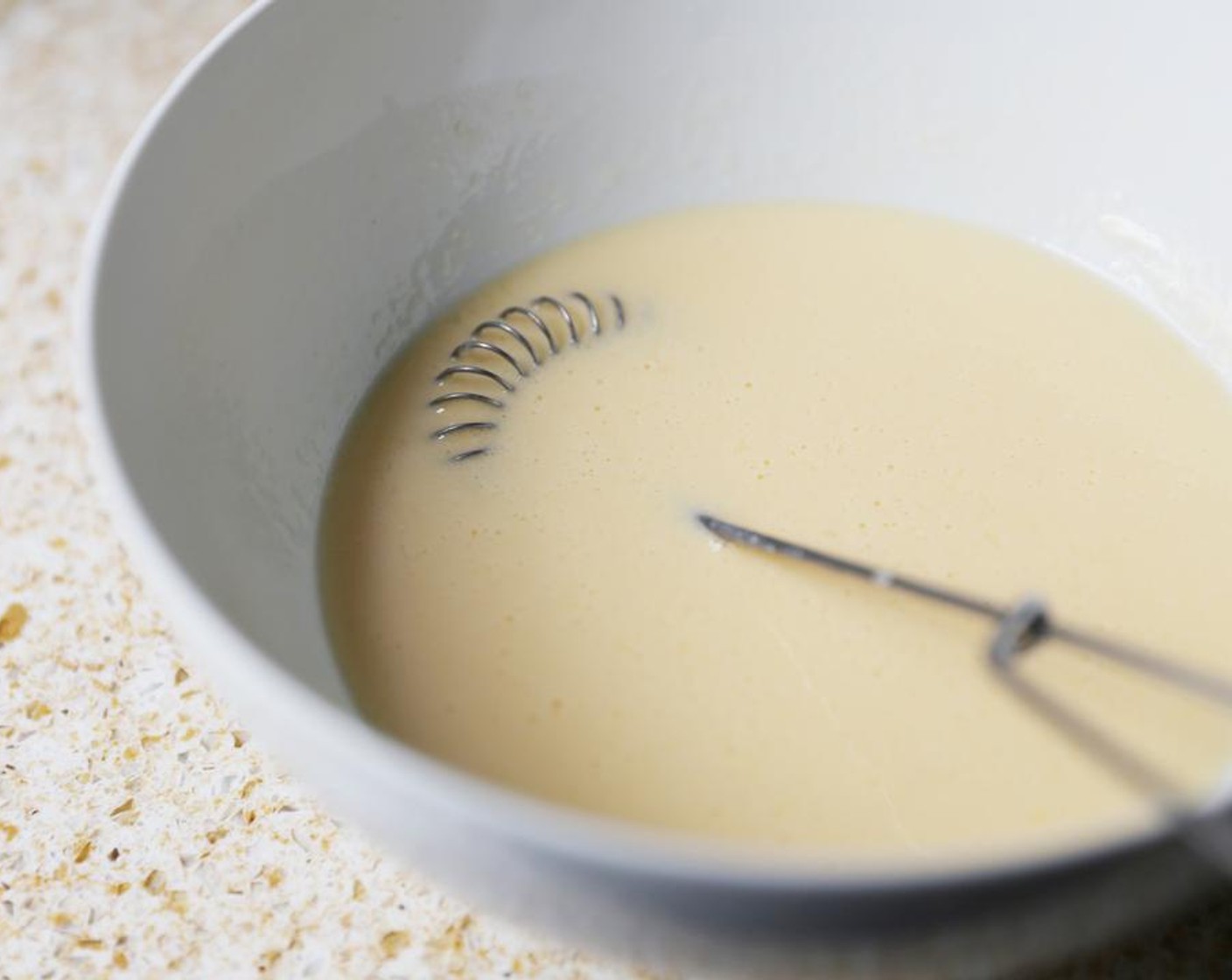step 2 Combine the Eggland's Best Classic Eggs (2), Buttermilk (1/2 cup) and Milk (1/2 cup) in a bowl and beat until well mixed. Reserve 2 tablespoons of the mixture to use later.