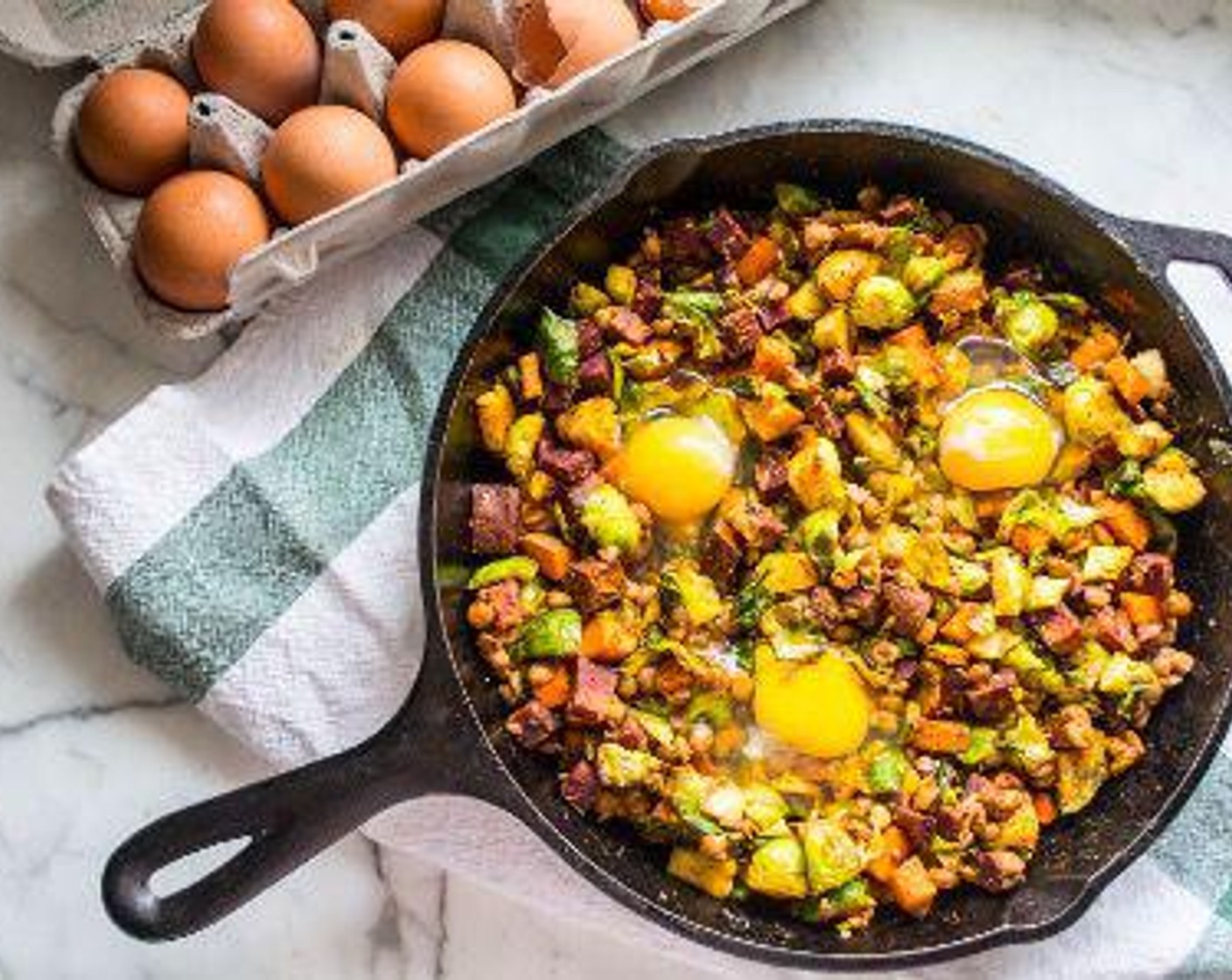 step 6 Increase oven temperature to 425 degrees F (220 degrees C). Add Eggland's Best Organic Eggs (Brown) (3) to skillet, spacing out evenly, and bake 10-15 minutes or until egg whites are cooked and yolks are soft.